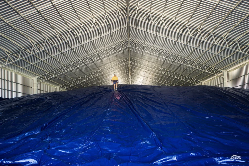 Tarped grain stack in FumoFlow shed